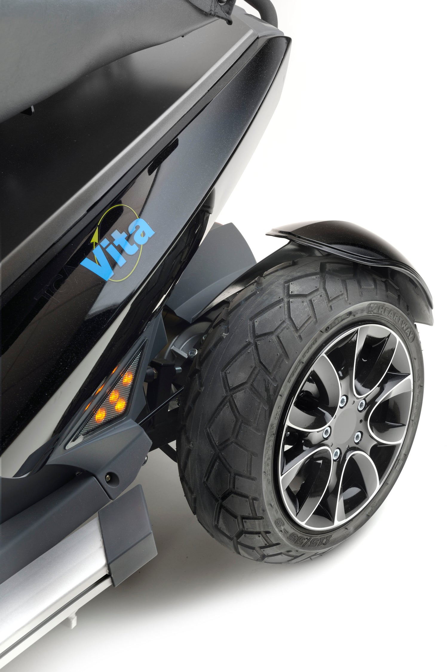 Larger 14" rear alloy wheels with a design unique to the Vita Sport